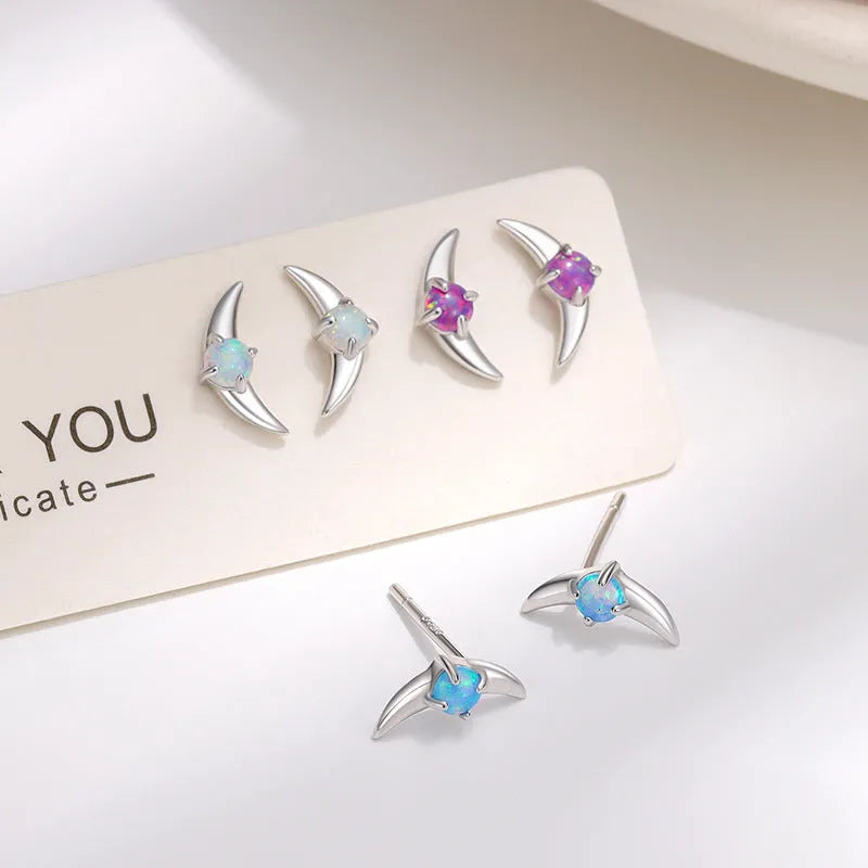Geometric 925 silver women's earrings with a stone accent, shown in gold and platinum colour options.