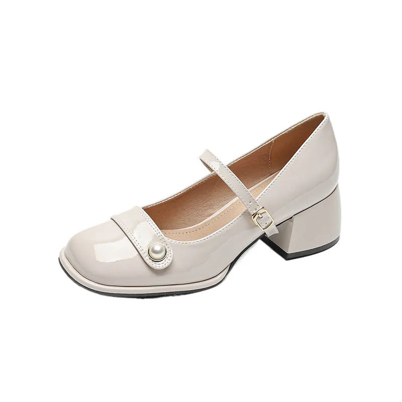 Women's apricot patent leather chunky heel ankle boots with a square toe and ankle buckle.