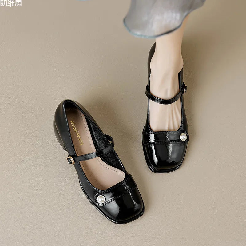 Women's apricot patent leather chunky heel ankle boots with a square toe and ankle buckle.
