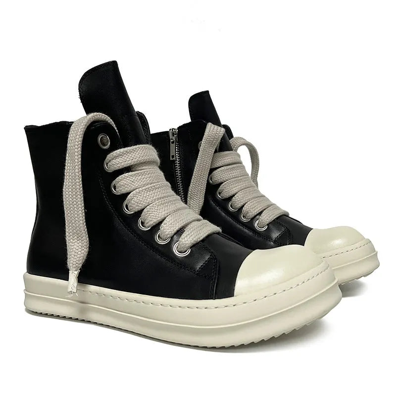 Black high-top leather boots with side zipper and round toe on a white background.