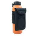Fitness magnetic bottle sleeve in black holding an insulated cup, showing the magnetic closure.