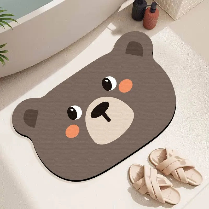 Cartoon animal diatomite bathroom mat with non-slip backing in brown bear, frog, hippo, koala, or lion design.