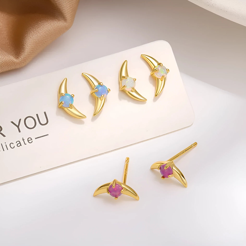 Geometric 925 silver women's earrings with a stone accent, shown in gold and platinum colour options.