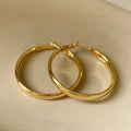 40mm circular metal earrings with gold or silver electroplated finish on copper