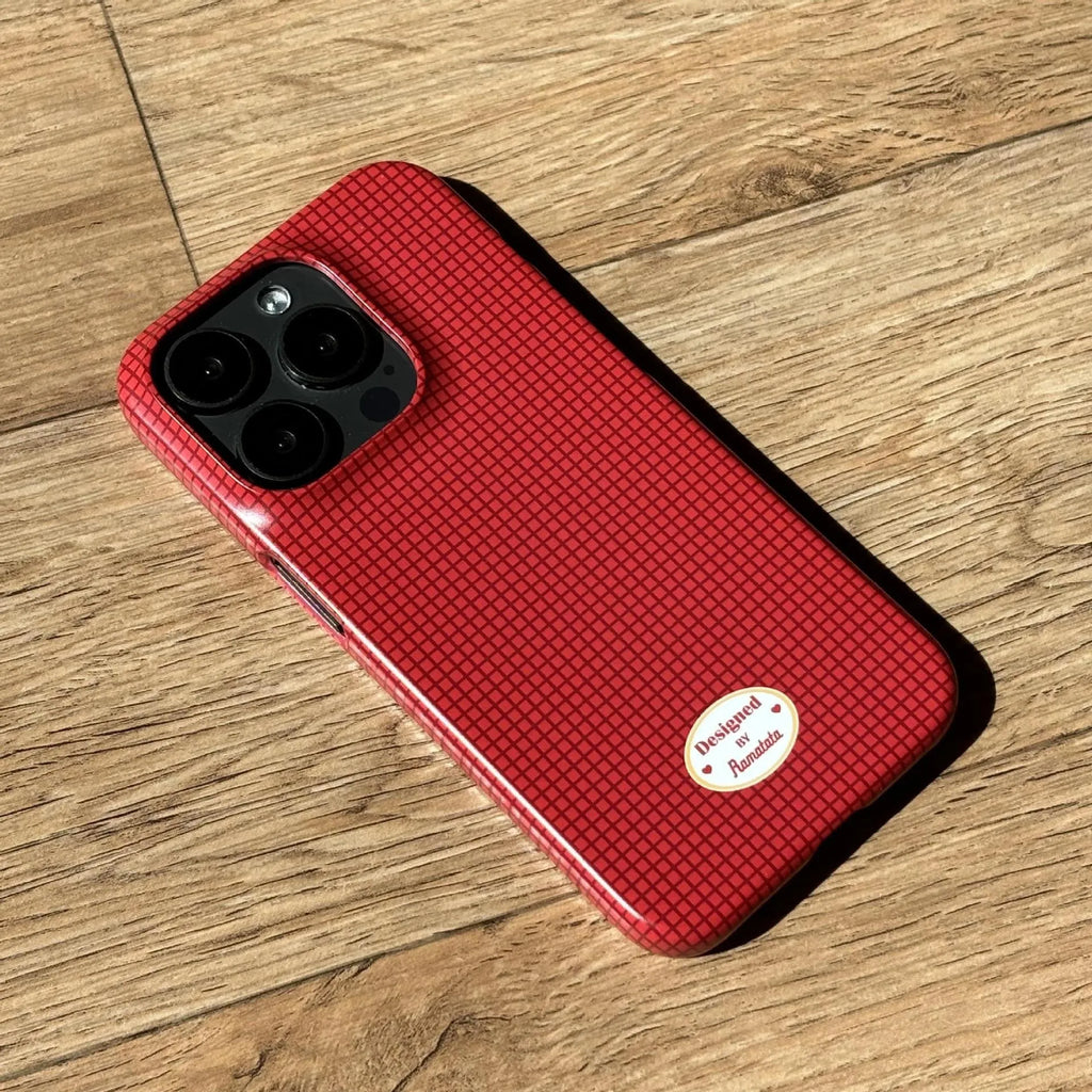 Original plain plaid design iPhone 15 Pro Max case in glossy red grid or frosted orange grid options.