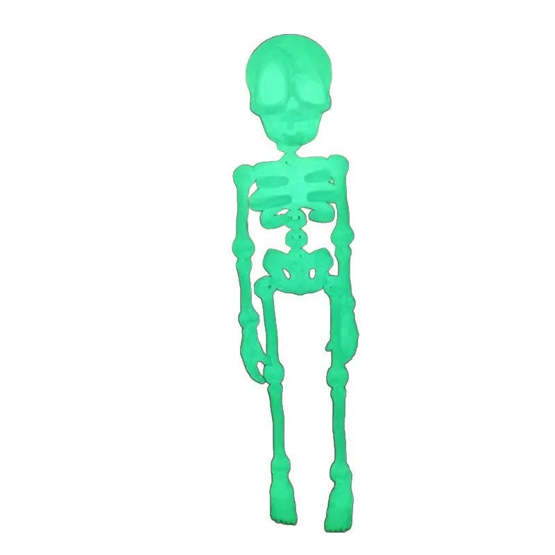 3D printed white skull refrigerator magnet on a metal surface, showing its 18cm height.