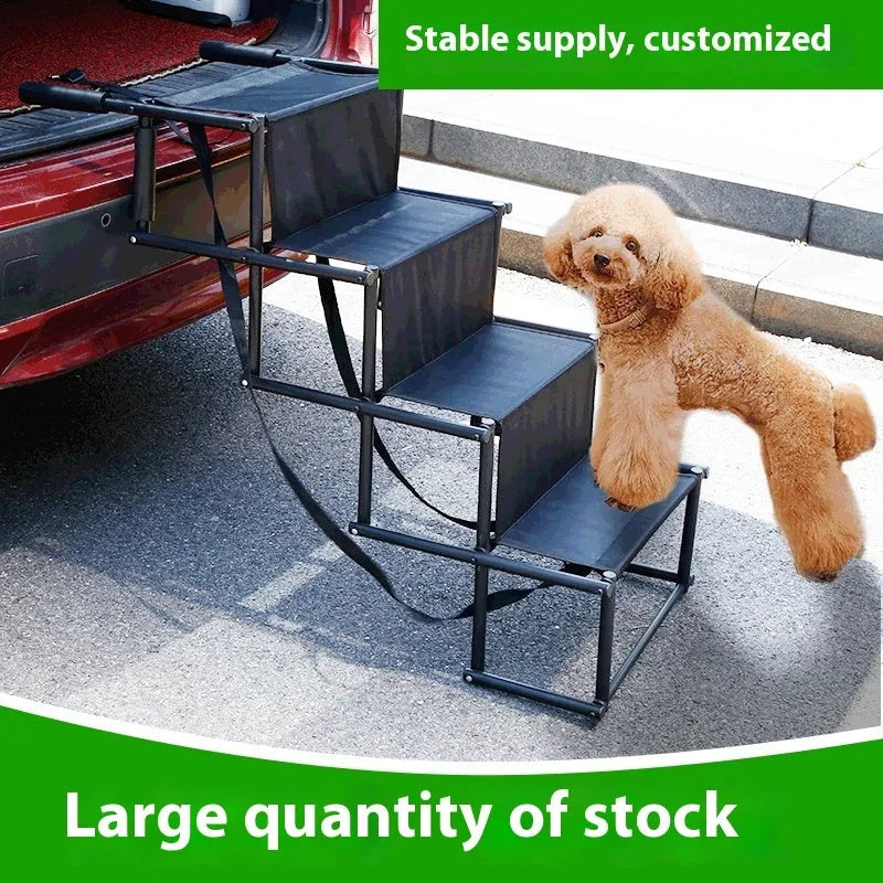 Folding four-step stainless steel dog ladder in navy blue, set up at a car tailgate.