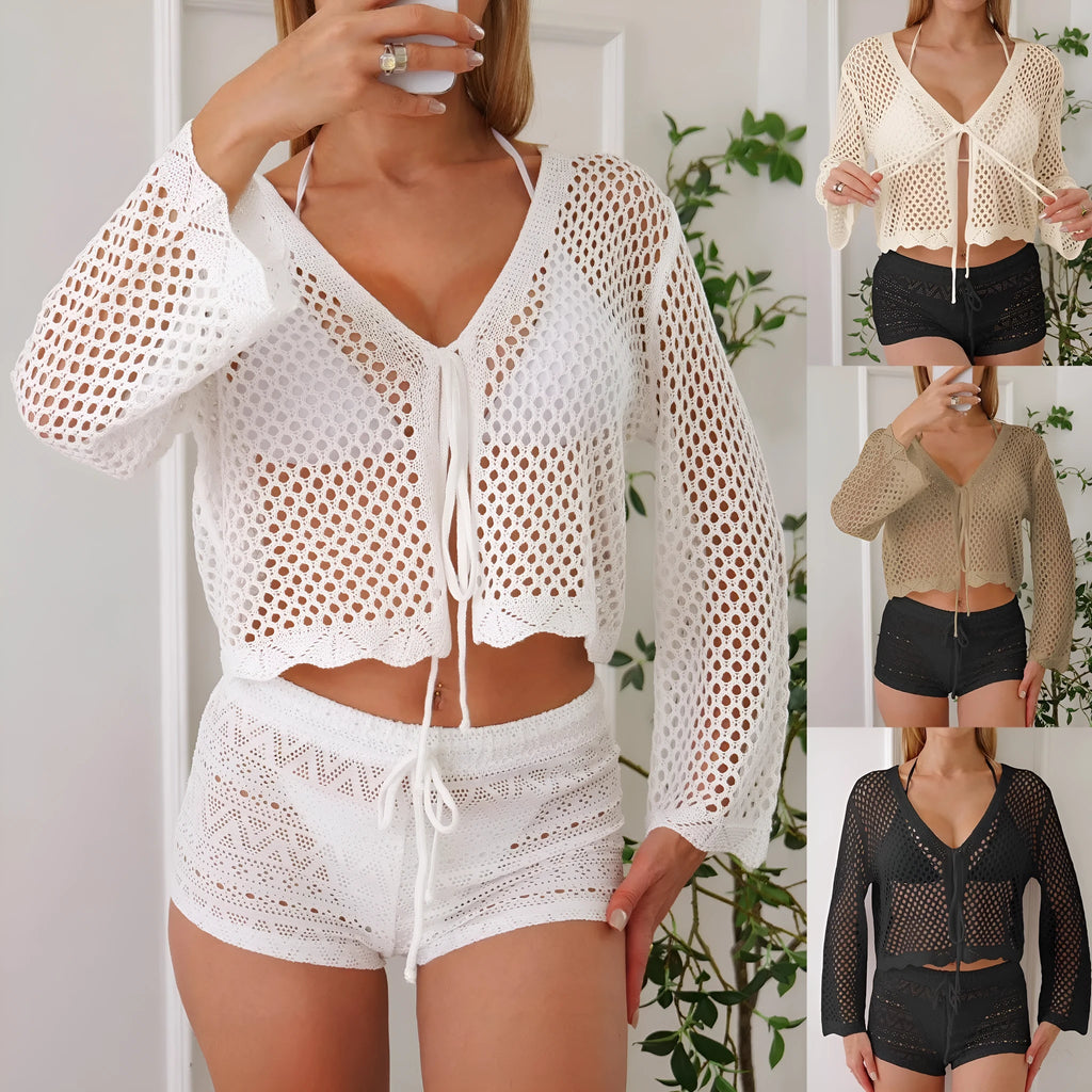 Short apricot hollow woven women's cardigan blouse with bell sleeves laid flat.