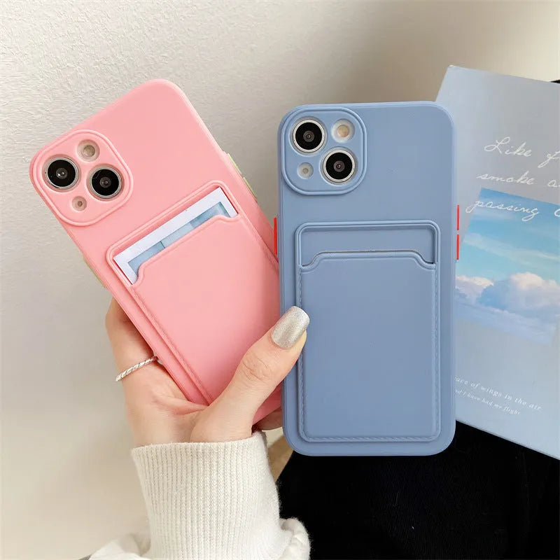 Sky blue colour block silicone iPhone case with a visible card slot on the back.