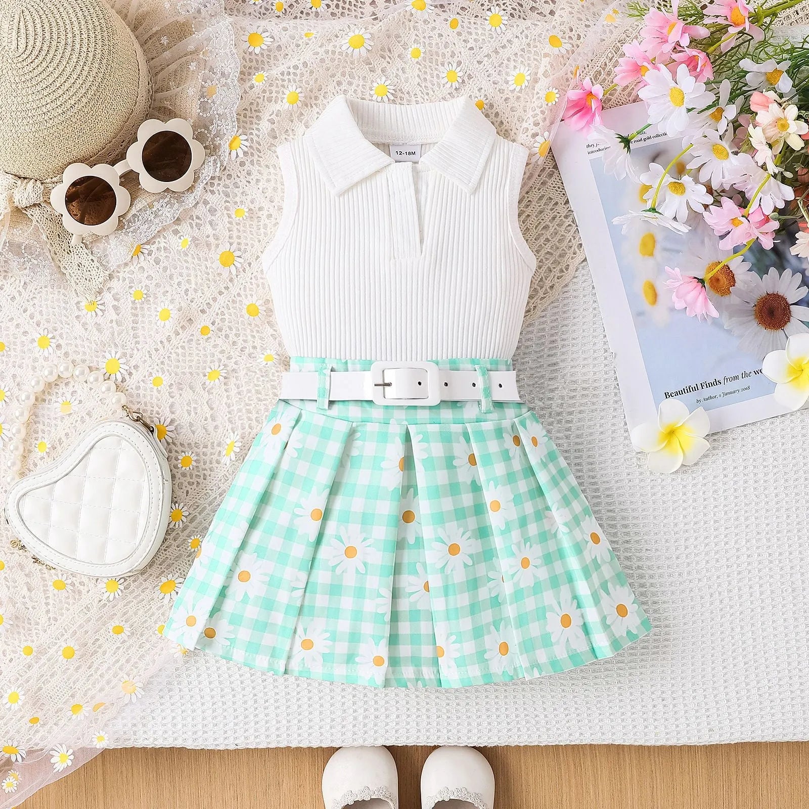 Girls three-piece skirt suit with sleeveless stripe top, daisy plaid skirt, and belt in green colour