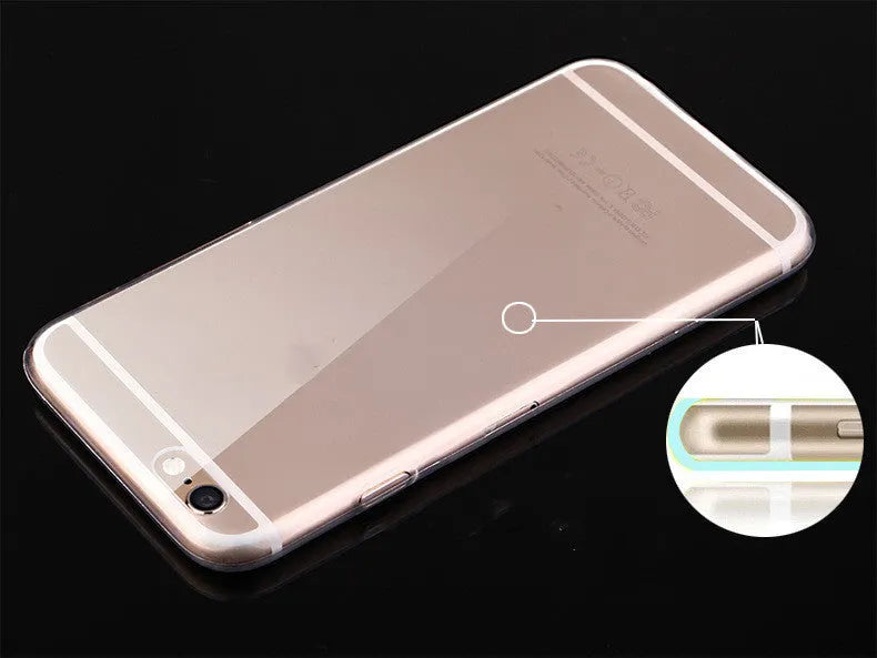Transparent TPU soft shell protective case for various iPhone models on a table.