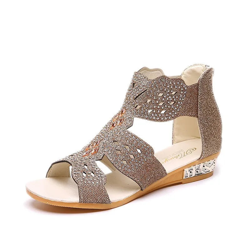 Women's flat open-toe sandals with rhinestones, hollow design, and a back zipper in beige.
