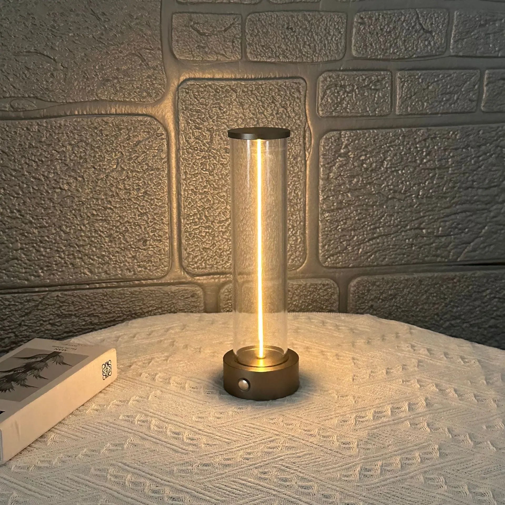 Modern linear glass USB LED night light strip with magnetic adhesive base.
