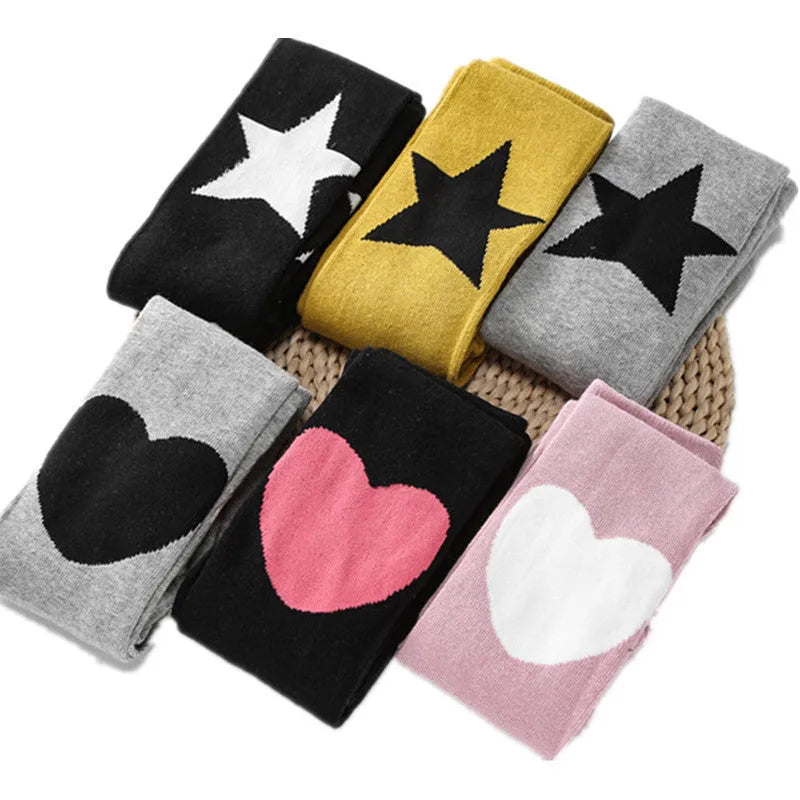 Girl's cotton leggings with five-pointed star and heart patterns in solid colour design