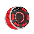 Waterproof Bluetooth speaker with large suction cup in black, mounted on bathroom tile
