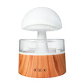 White cloud-shaped humidifier and aroma diffuser with falling water droplets and coloured lights