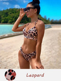 Women's backless skinny bikini swimwear in polyester fabric showing colour options