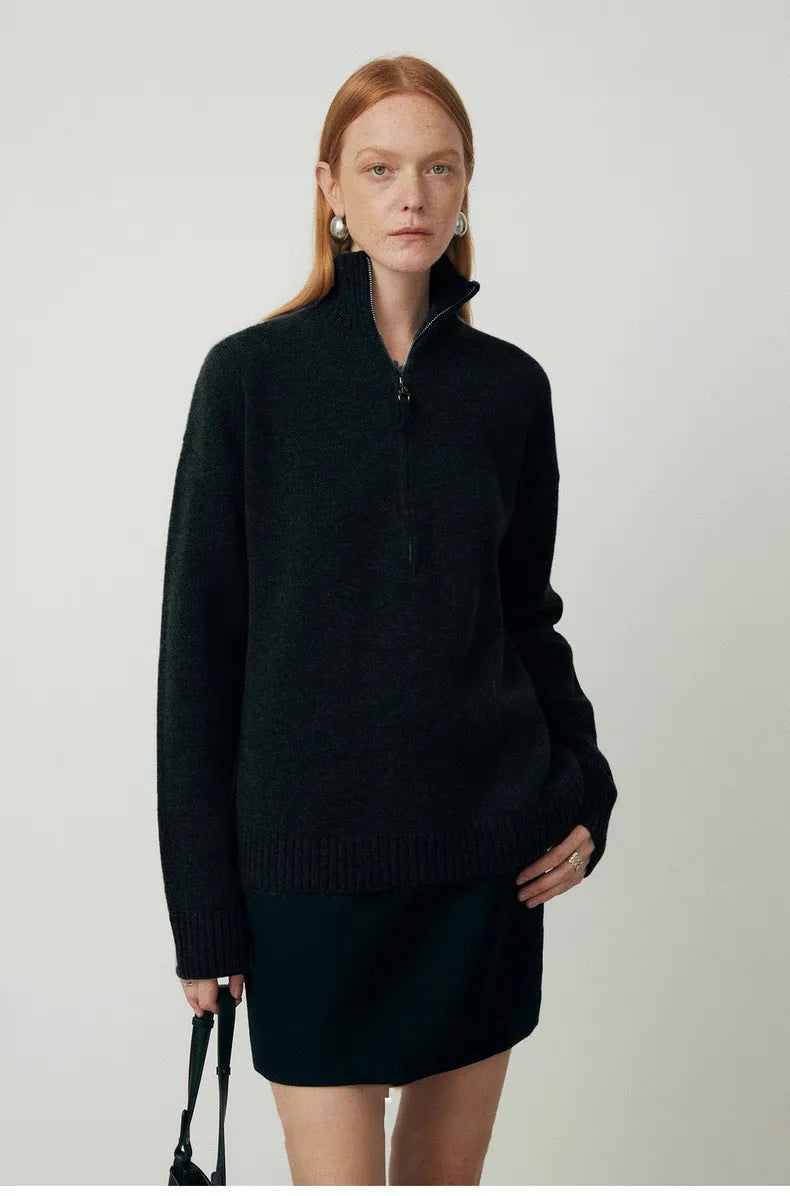 Wool bandage dress with loose lapels and long sleeves in black.