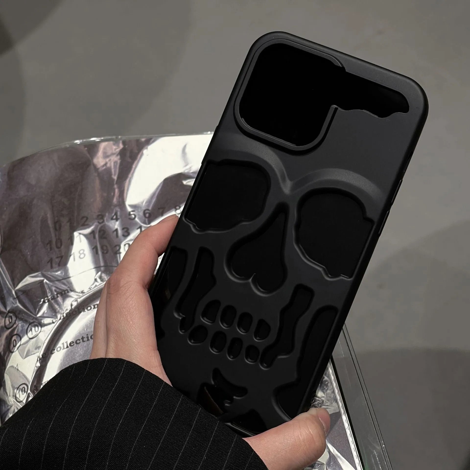 Frosted skull hollow TPU phone case for Apple iPhone in matte black