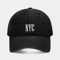 Retro denim peaked baseball cap with an alphabet letter, shown in light blue, dark blue, and black colours.