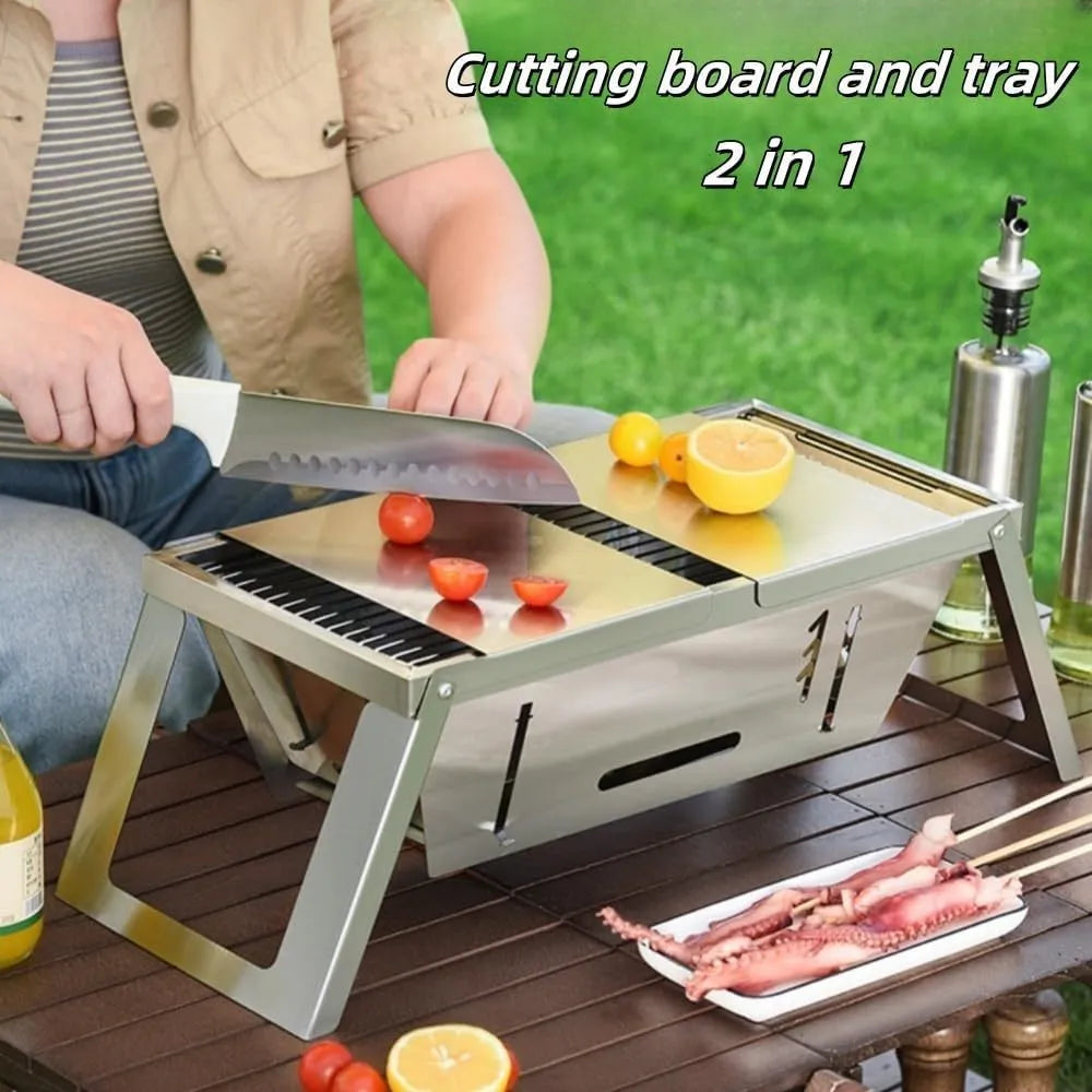 Small foldable portable charcoal grill for outdoor use.