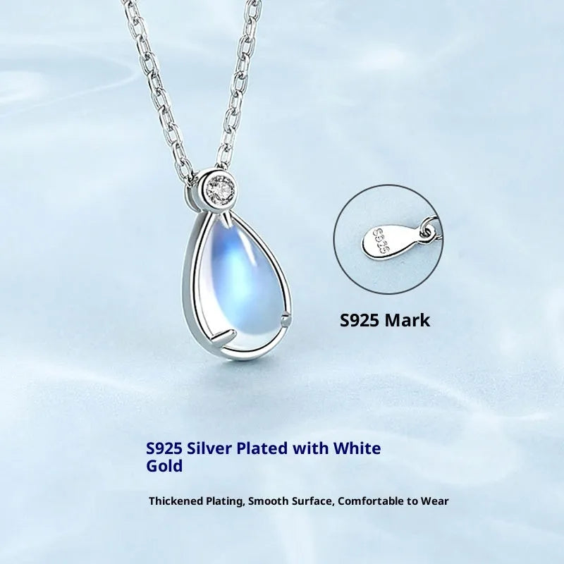 Women's 925 sterling silver moonstone necklace with adjustable chain on a neutral background