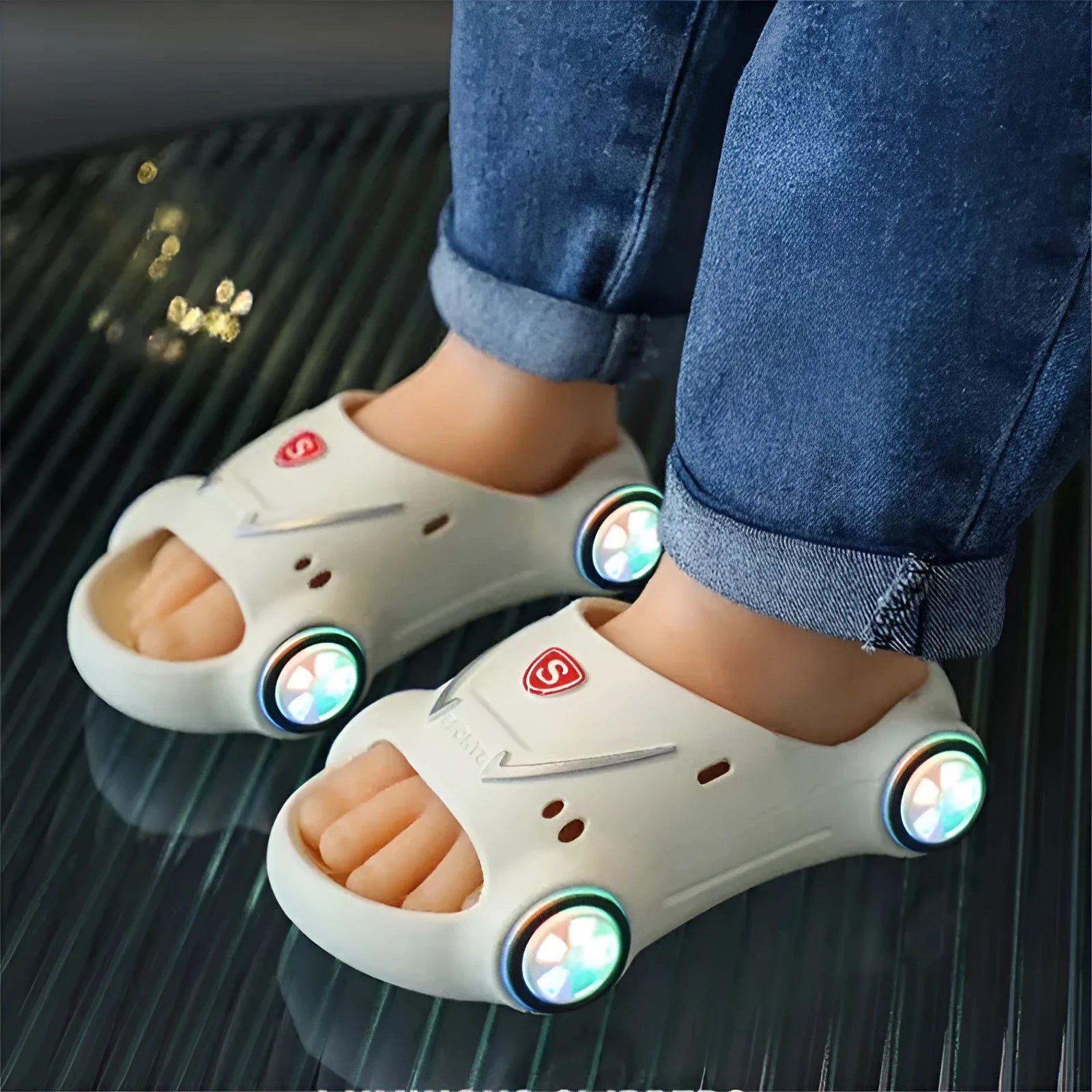 Children's luminous PVC slippers with cartoon car design and anti-slip textured soles