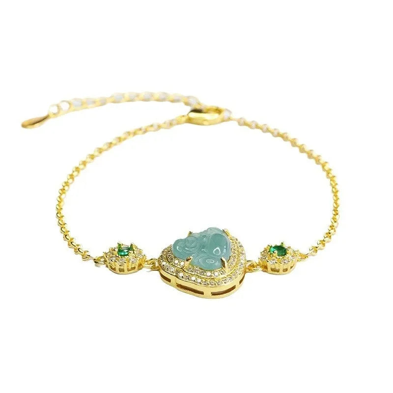 Blue jade bracelet with carved Maitreya Buddha, 10x13mm, inlaid design.