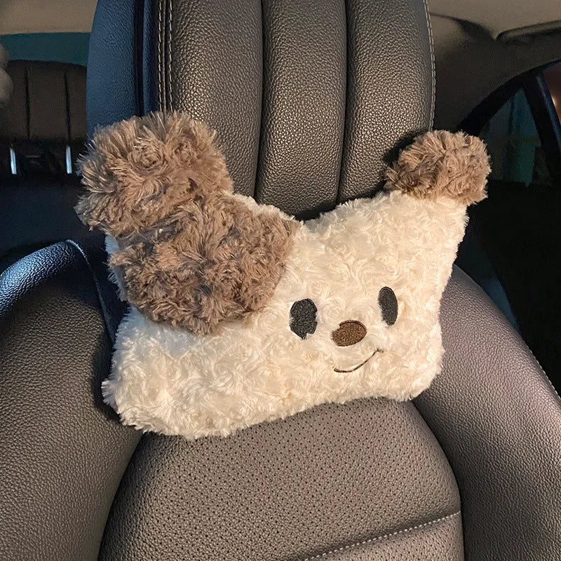 Puppy plush car headrest cushion and matching lumbar support pillow on a car seat.