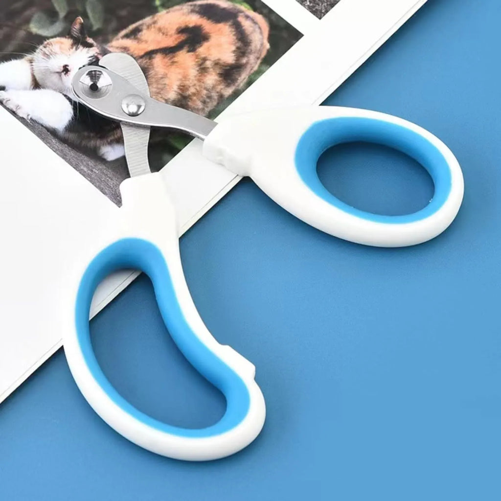 Blue cat nail clippers with circular cut hole design and cushioned non-slip handles.