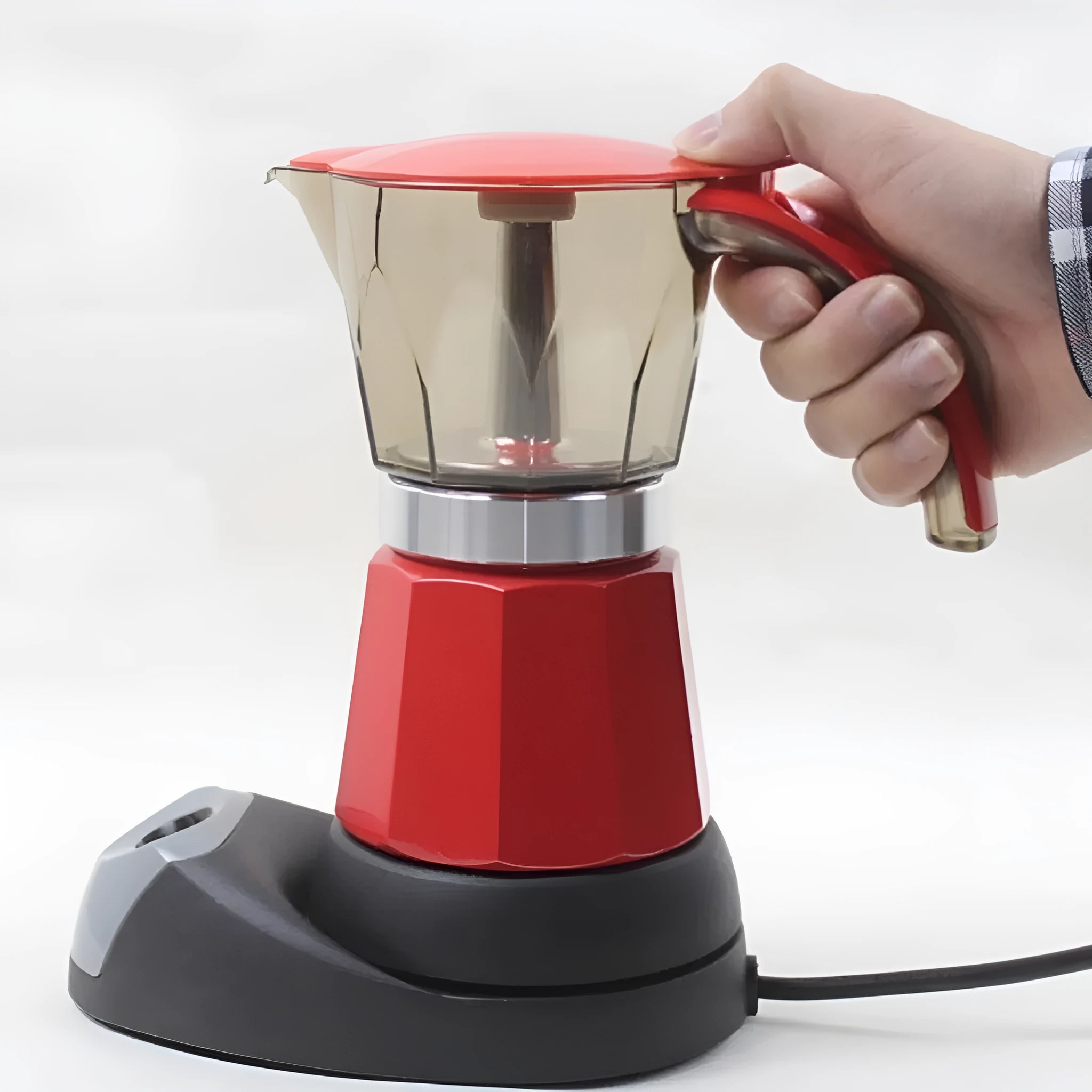 Octagonal electric aluminium moka pot coffee maker in blue colour on a kitchen counter