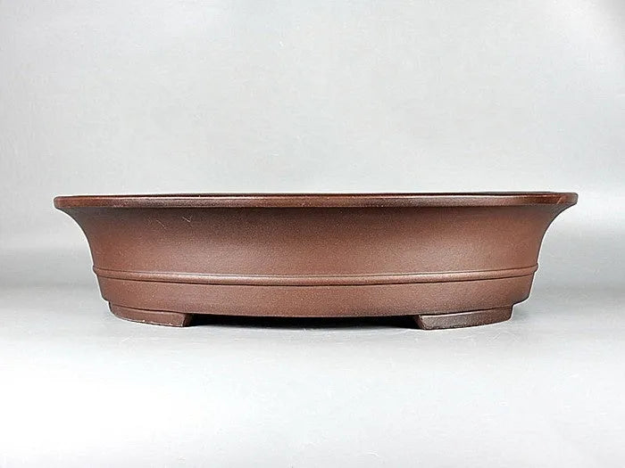 Handmade antique oval Yixing Purple Mud bonsai pot with dimensions 66x53x14.5cm for pine and cypress