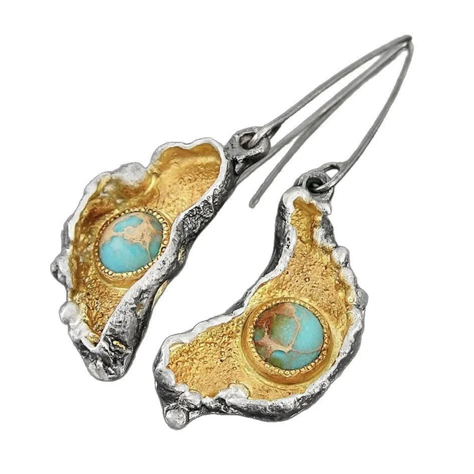 Ear-shaped women's earrings in alloy with a two-tone oil-painted geometric finish, shown as a pair