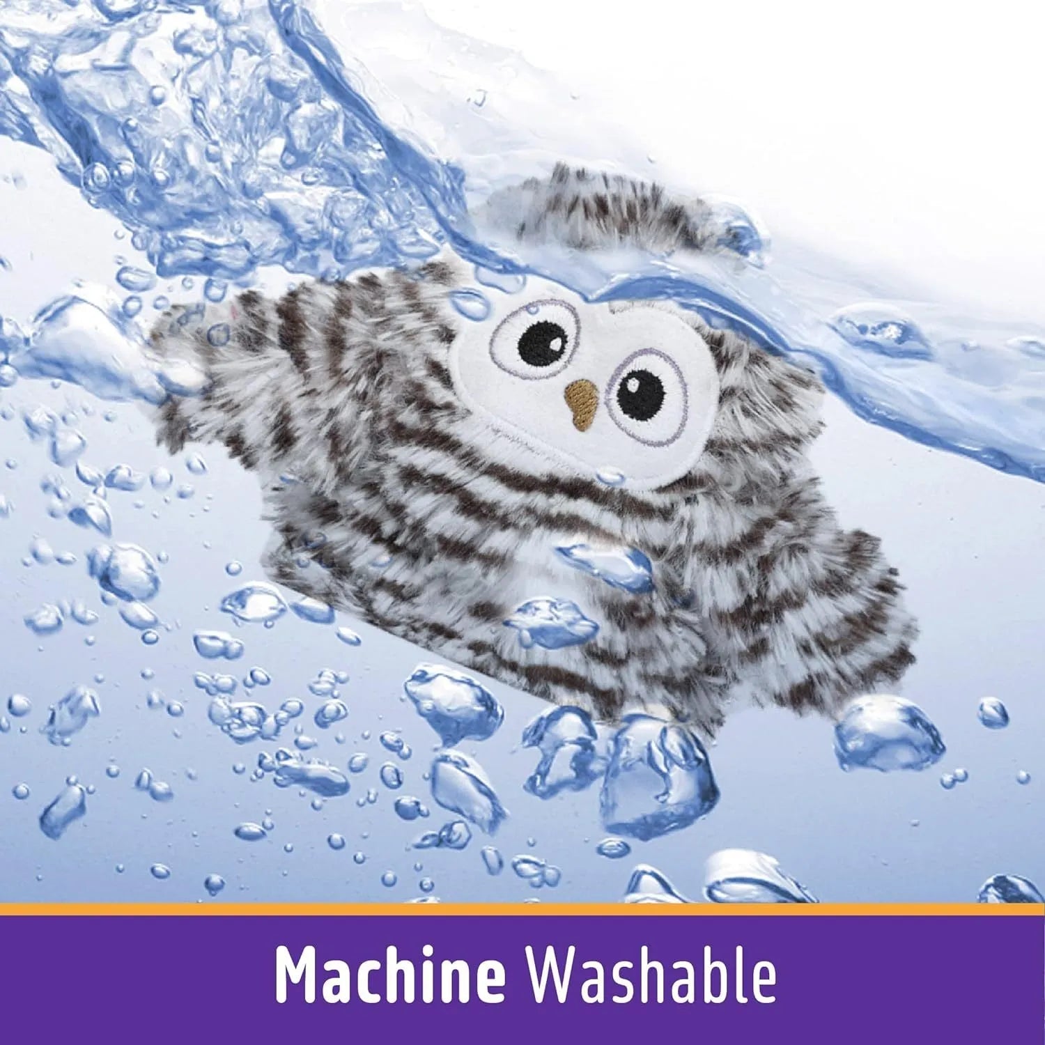 Grey automatic chirping owl cat toy with flapping wings on flat surface