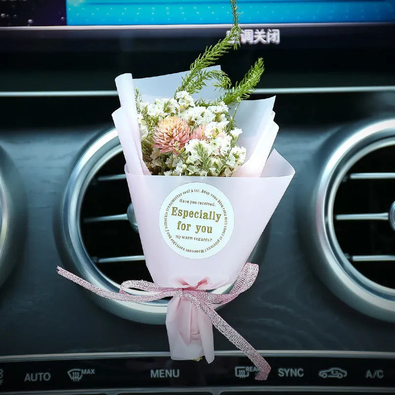 Car air conditioning vent clip with dried flower ornament and perfume bottle in various colour options