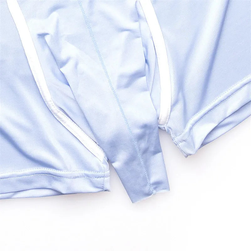 Pair of solid colour men's boxer shorts in Ice Silk fabric showing mid waist design.