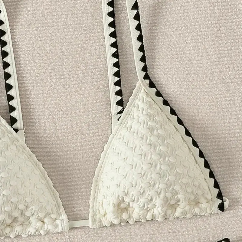 Women's white and blue split bikini swimsuit in polyester fabric with briefs style