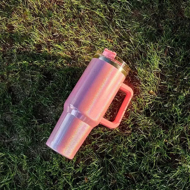 Stainless steel vacuum insulation cup in rainbow gradient colours showing double-layer construction