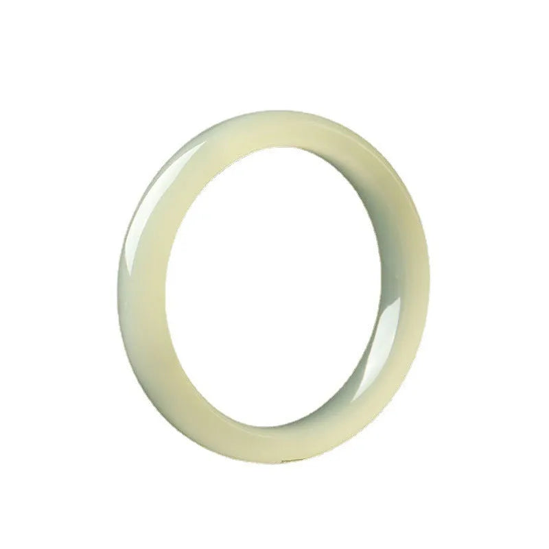 Ice silk jade round bar bracelet on a wrist, showing its smooth, continuous loop and polished stone finish.