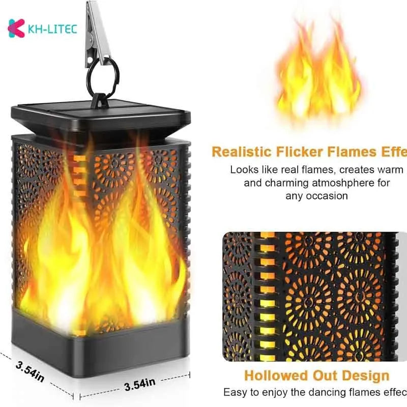 Set of four black solar-powered garden torch lights with flickering flame LED effect on a patio.