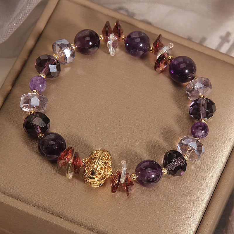 Purple crystal pumpkin bead bracelet with wind chime charms and rhinestone accents for women