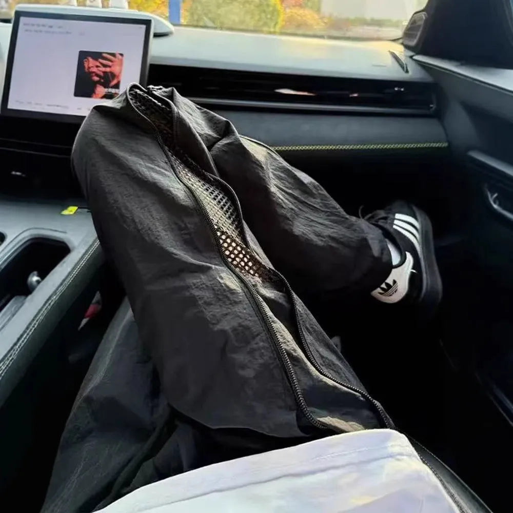 Men's side zipper outdoor technical trousers in black, straight-leg polyester design for summer