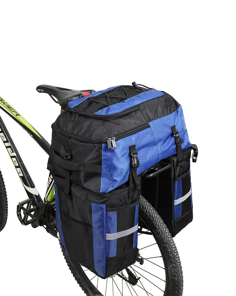 Rhinoceros green 70L bicycle rear storage frame bag mounted on a touring bike.