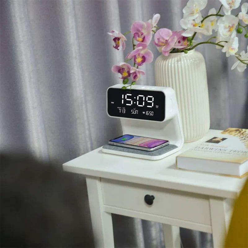 White 3-in-1 bedside lamp with wireless charging pad, LCD clock display, and touch controls.