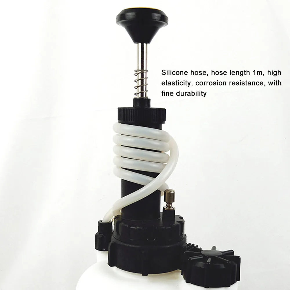 White 3-litre automotive brake fluid tank replacement tool with copper, iron, and plastic construction.