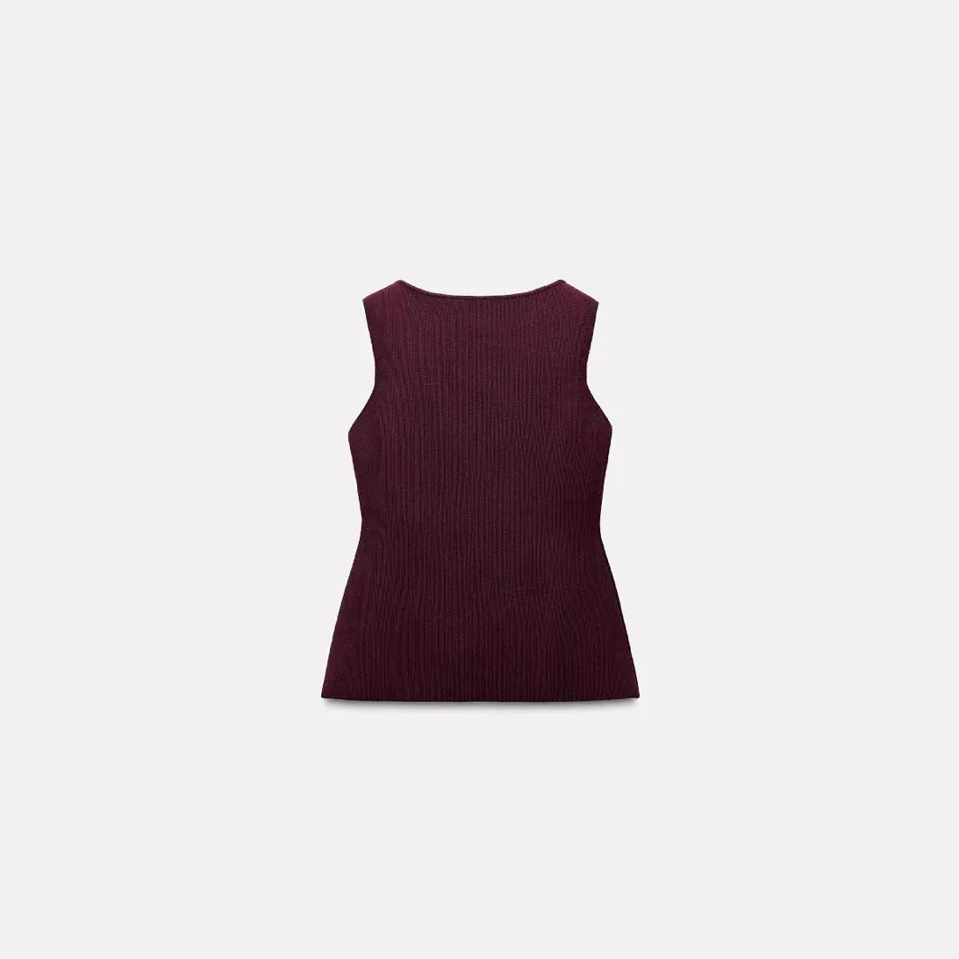 Dark red slim-fit sweater vest with gold buttons and 3D patterning on mannequin