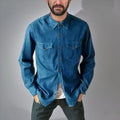 A button-front denim cardigan coat in a choice of khaki, black, blue, or grey.