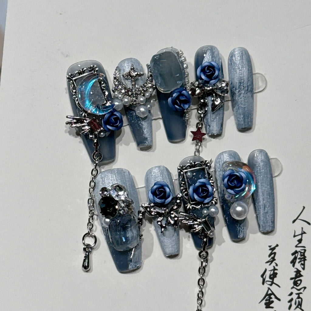 Evening manicure set with ornate rose pattern in heavy industry night blue colour
