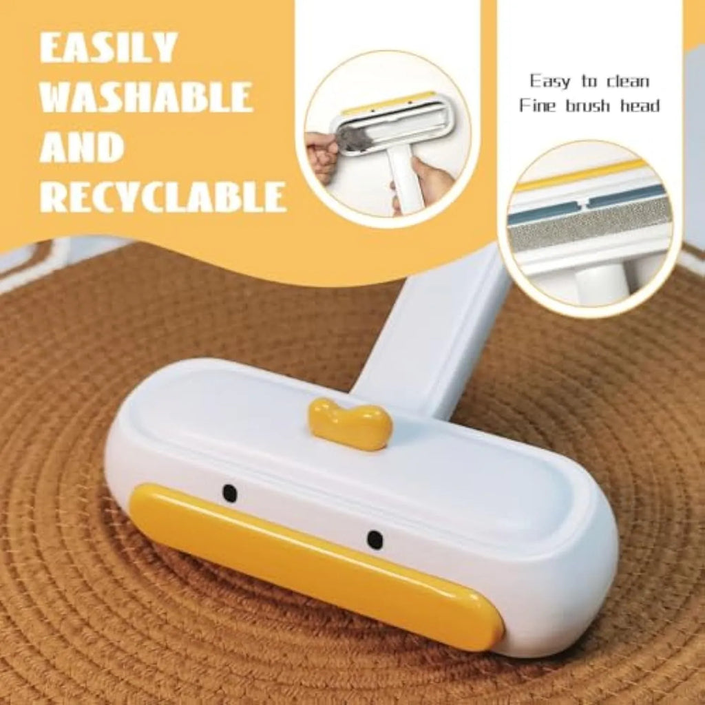 Yellow duck design reusable pet hair remover roller with plastic body and bristles.