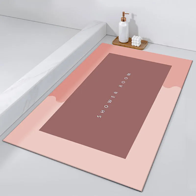 Diatom mud absorbent bathroom floor mat in blue rectangular shape on tiled floor